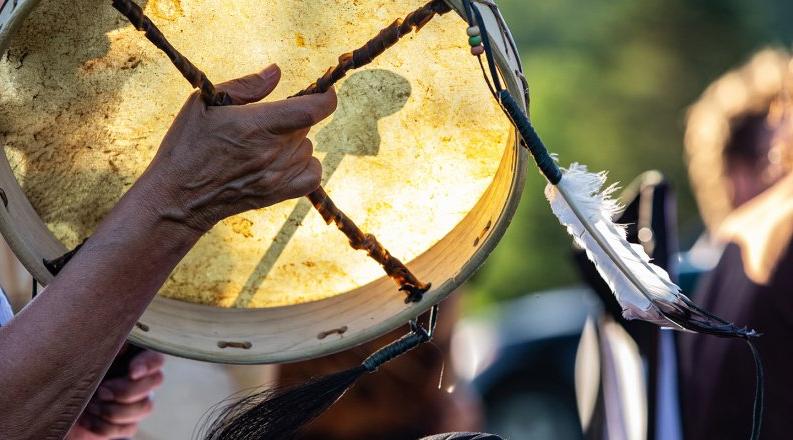 Native American sacred drums during spiritual singing